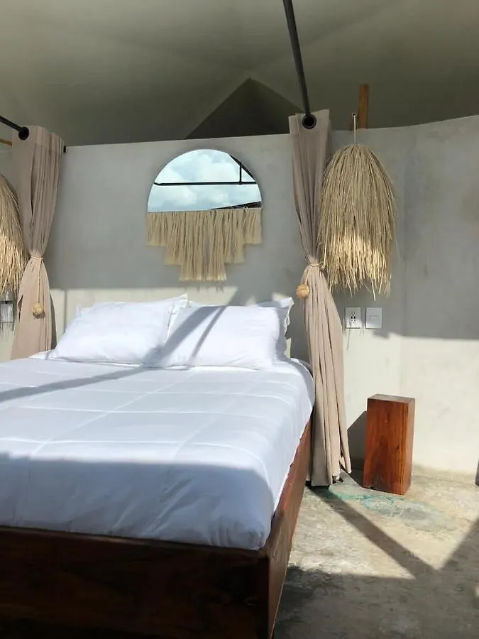 فندق Mamasan Treehouses & Cabins تولوم